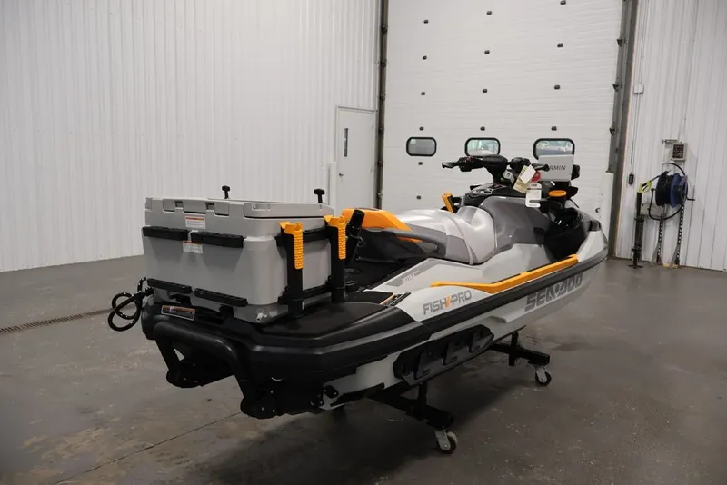 Slide: The Image of 2026 Sea-Doo FishPro Trophy 170 jet ski in a garage setting. - 6