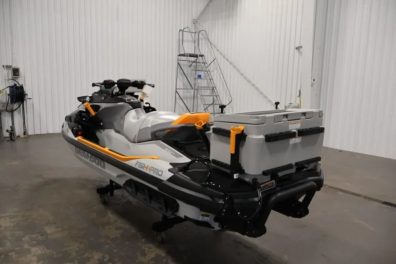 Slide: The Image of 2026 Sea-Doo FishPro Trophy 170 jet ski in a garage setting. - 7