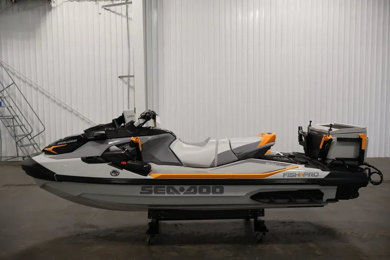 Slide: The Image of 2026 Sea-Doo FishPro Trophy 170 jet ski in a showroom setting. - 9