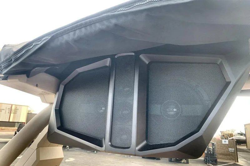 Slide: The Image of 2026 Supra SE 550 boat speakers under canopy, showcasing modern audio design. - 23