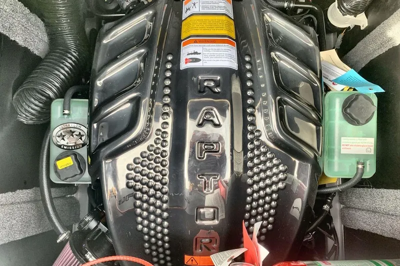 Slide: The Image of Engine of 2026 Supra SE 550 with "Raptor" branding and ultra-low emission label. - 24