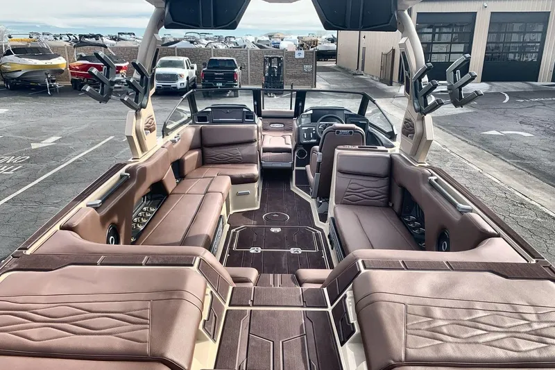 Slide: The Image of Luxurious interior of 2026 Supra SE 550 boat with spacious seating and modern design. - 9