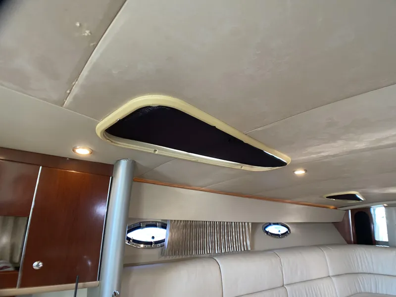 Slide: The Image of Interior of a 2006 Formula 400 Super Sport boat, featuring elegant design and lighting. - 24