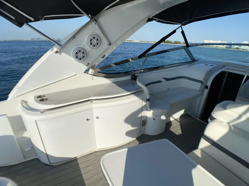 Slide: The Image of 2006 Formula 400 Super Sport yacht interior with seating and ocean view. - 32