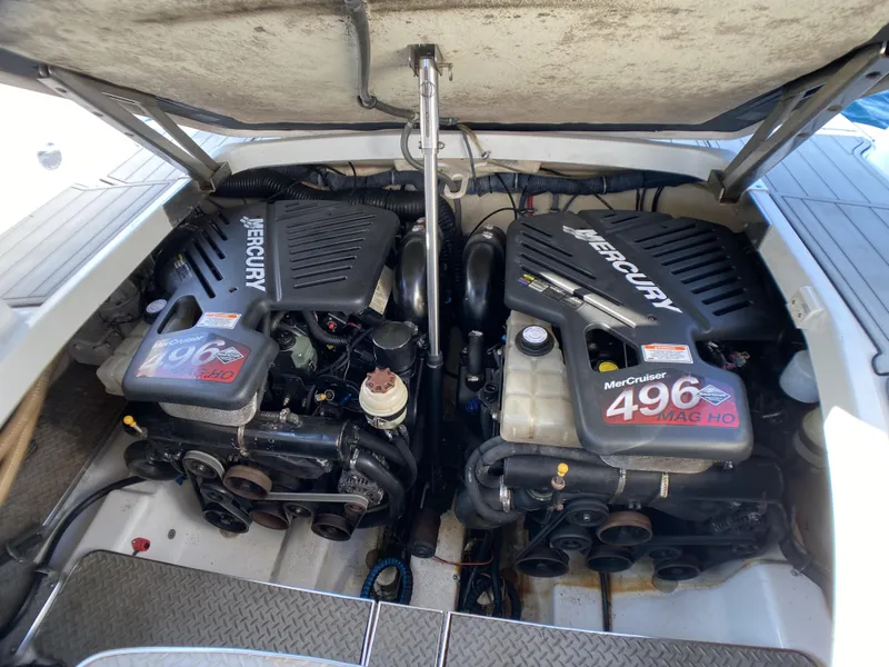 Slide: The Image of Twin Mercury engines in a 2006 Formula 400 Super Sport boat. - 47