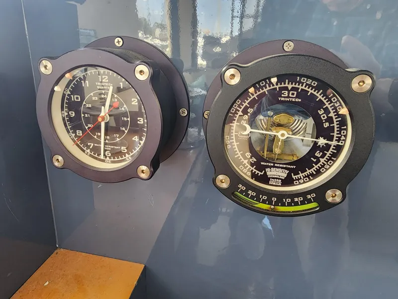 Slide: The Image of Close-up of 1987 Riva SuperAmerica boat gauges, featuring speedometer and depth indicator. - 13