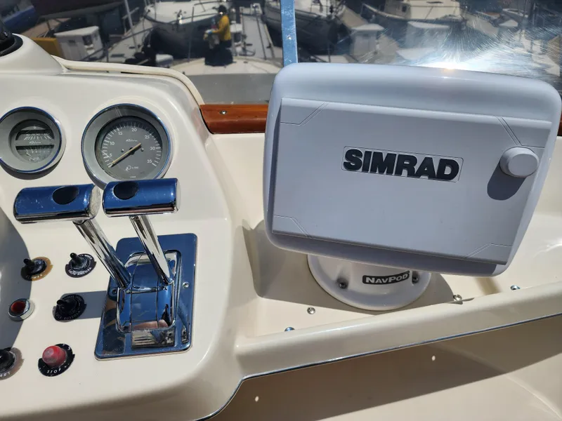 Slide: The Image of Control panel of 1987 Riva SuperAmerica yacht with Simrad navigation system. - 35