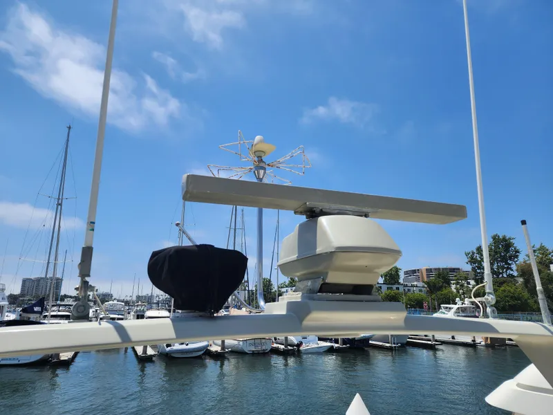 Slide: The Image of Radar equipment on a 1987 Riva SuperAmerica yacht in a marina. - 47