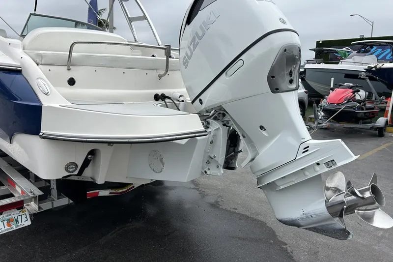 Slide: The Image of 2009 Monterey 278 SSC boat with Suzuki outboard motor on trailer. - 30