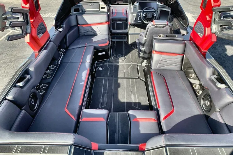 Slide: The Image of 2026 Supra SL 550 boat interior with sleek seating and modern design elements. - 10