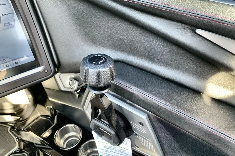 Slide: The Image of 2026 Supra SL 550 interior detail with control knob and touchscreen display. - 16