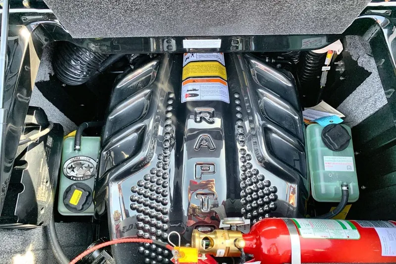 Slide: The Image of Engine compartment of a 2026 Supra SL 550 with "Raptor" branding and fire extinguisher. - 20