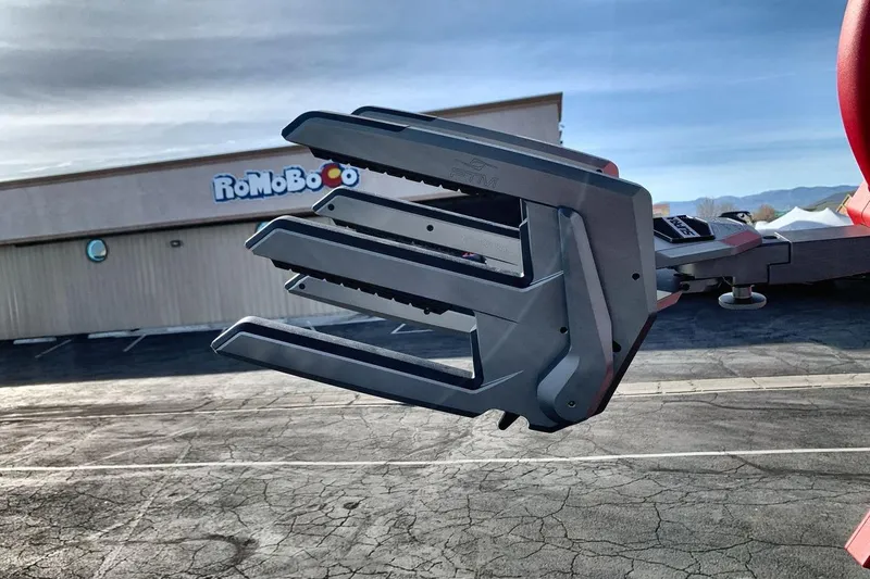 Slide: The Image of Robotic arm detail of 2026 Supra SL 550 in parking lot setting. - 22