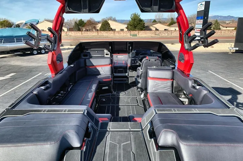 Slide: The Image of 2026 Supra SL 550 boat interior with sleek seating and modern design elements. - 9