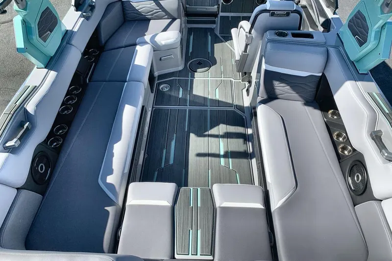 Slide: The Image of Luxurious interior of 2026 Supra SL 550 boat with sleek seating and modern design. - 10