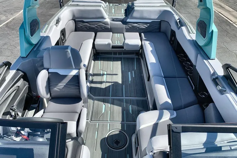 Slide: The Image of 2026 Supra SL 550 boat interior with luxurious seating and modern design. - 12