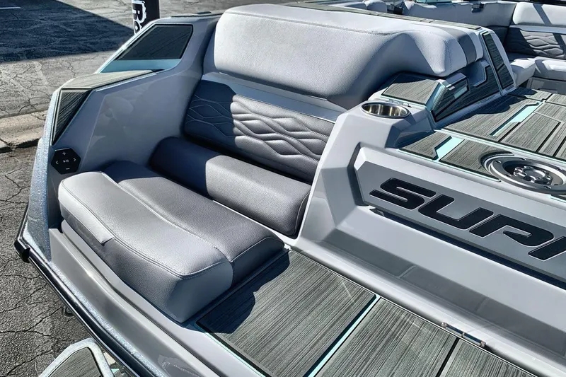 Slide: The Image of 2026 Supra SL 550 boat interior with sleek gray seating and modern design. - 19