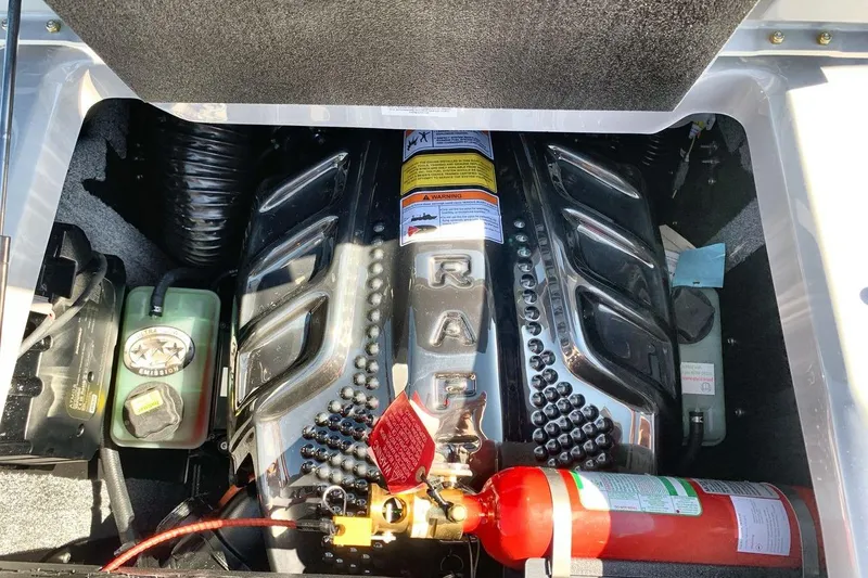 Slide: The Image of 2026 Supra SL 550 engine compartment with chrome details and safety equipment. - 20