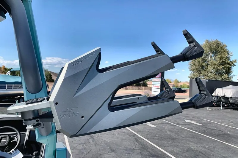 Slide: The Image of 2026 Supra SL 550 boat mirror with sleek design in outdoor setting. - 22