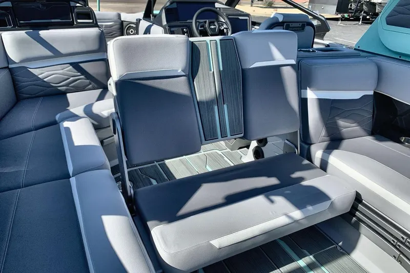Slide: The Image of Interior of 2026 Supra SL 550 boat with modern seating and sleek design. - 23