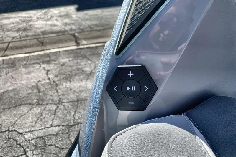 Slide: The Image of 2026 Supra SL 550 audio control panel with sleek design and intuitive buttons. - 26