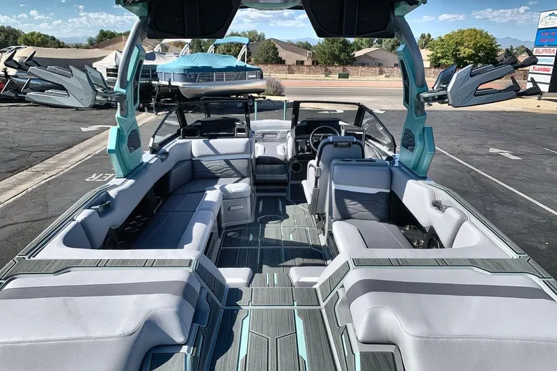 Slide: The Image of 2026 Supra SL 550 boat interior with modern seating and sleek design. - 9