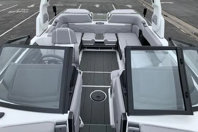 Slide: The Image of 2026 Supra SA 450 boat interior with sleek seating and modern design. - 12