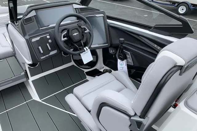 Slide: The Image of 2026 Supra SA 450 boat interior with modern dashboard and steering wheel design. - 13