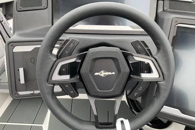Slide: The Image of Steering wheel of 2026 Supra SA 450 boat with modern controls and sleek design. - 14