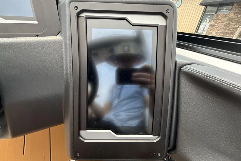 Slide: The Image of 2025 Supra SA 550 dashboard touchscreen display with reflection. - 15