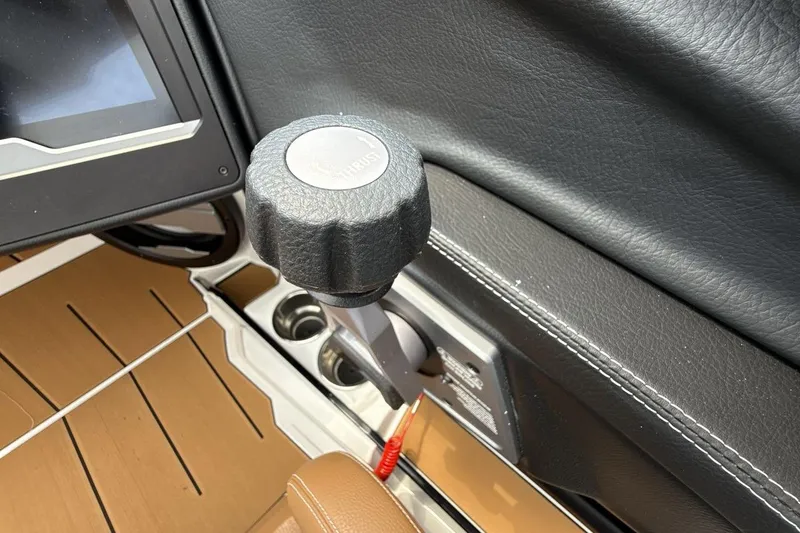 Slide: The Image of 2025 Supra SA 550 interior, featuring a sleek throttle control and modern dashboard design. - 16