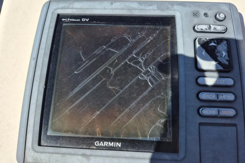 Slide: The Image of Cracked Garmin echomap DV screen on 1993 Dusky 227 Open Fisherman boat. - 15