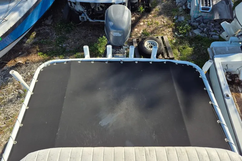 Slide: The Image of 1993 Dusky 227 Open Fisherman boat with outboard motor, viewed from above. - 17