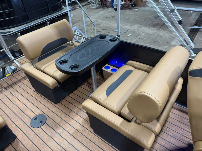 Slide: The Image of Interior of Bentley Pontoons Legacy 220 QSB, luxurious seating and table. - 16