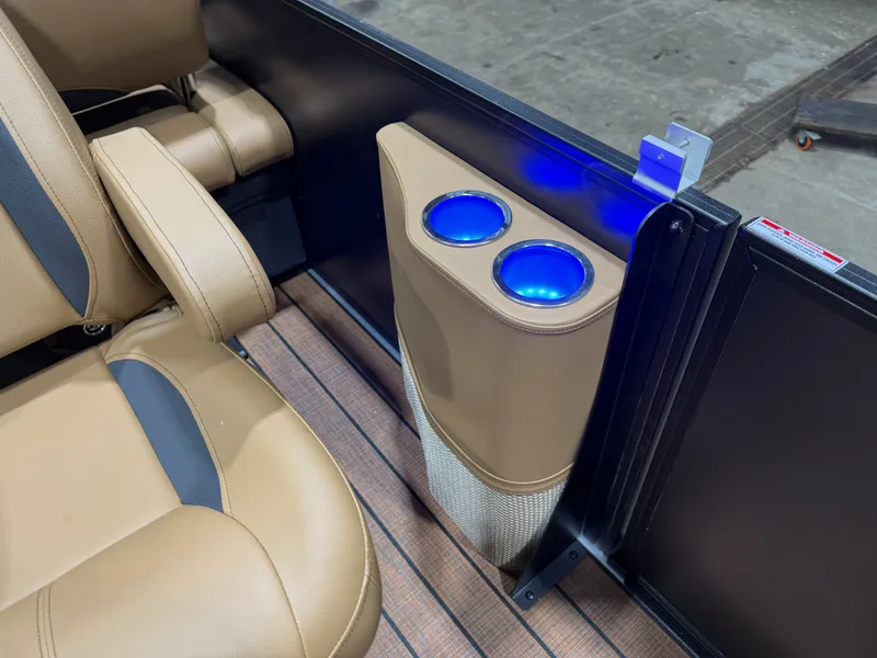 Slide: The Image of Interior of Bentley Pontoons Legacy 220 QSB with illuminated cup holders. - 26