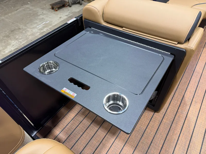 Slide: The Image of Bentley Pontoons Legacy 220 QSB table with cup holders, 2026 model. - 28