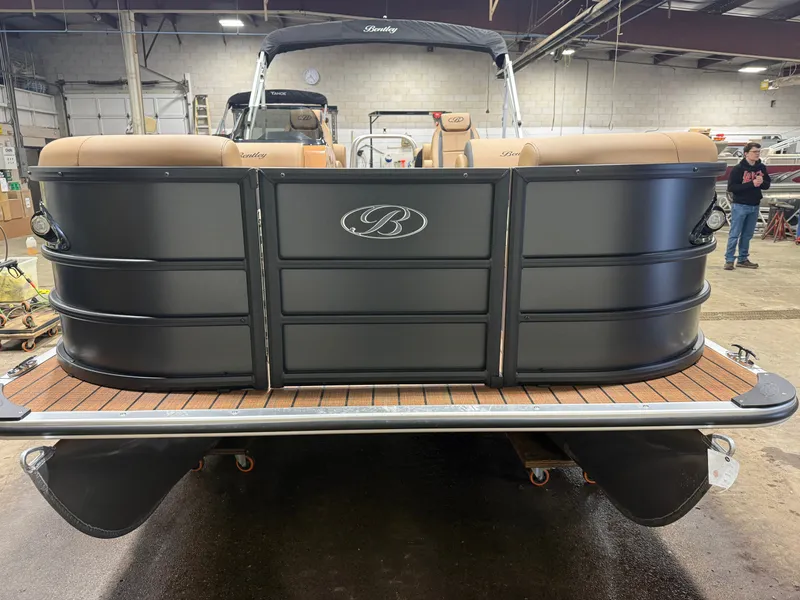 Slide: The Image of 2026 Bentley Pontoons Legacy 220 QSB interior, black paneling, luxurious design. - 35