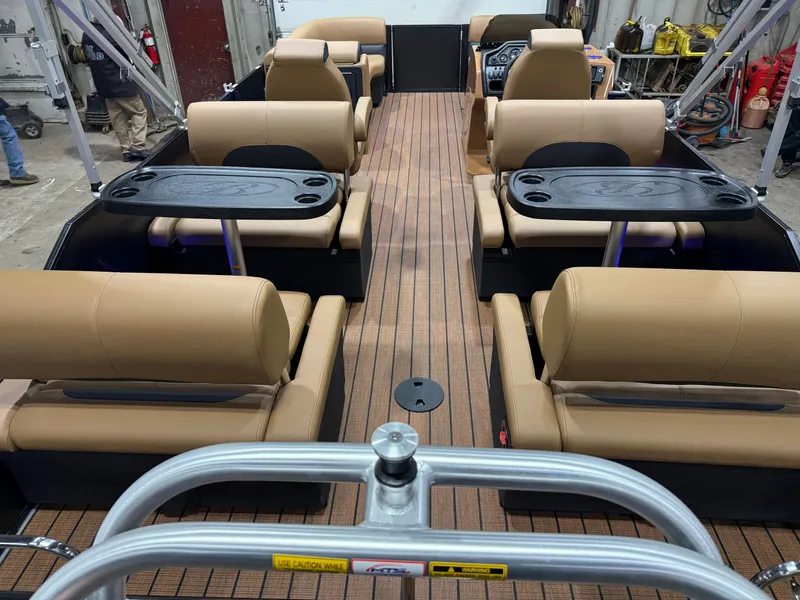 Slide: The Image of Interior of Bentley Pontoons Legacy 220 QSB Swingback, luxurious seating and tables. - 5