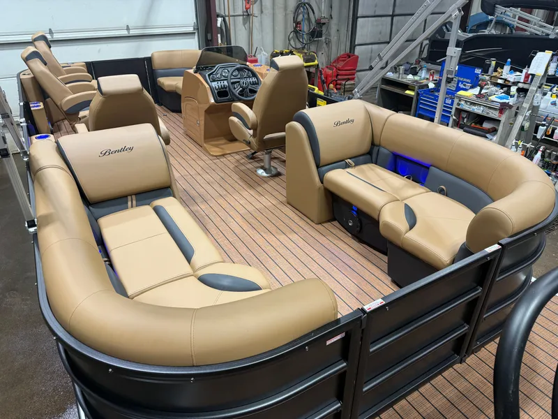 Slide: The Image of 2026 Bentley Pontoons Legacy 220 Navigator DL interior, luxurious seating. - 19