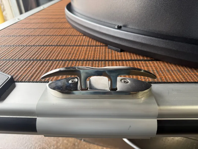 Slide: The Image of Close-up of boat deck with stainless steel cleat, Bentley Pontoons 2026. - 34