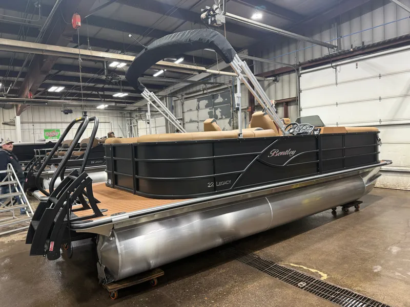 Slide: The Image of 2026 Bentley Pontoons Legacy 220 Navigator displayed indoors. - 42