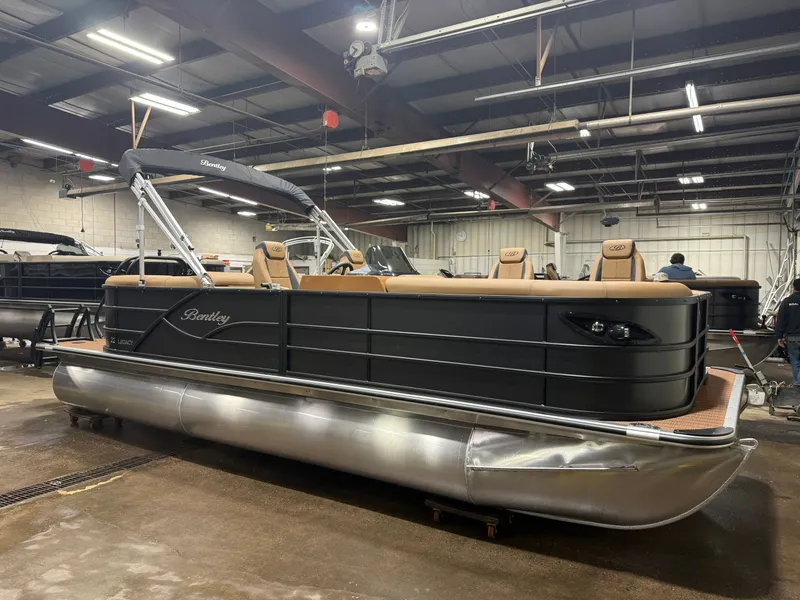 Slide: The Image of 2026 Bentley Pontoons Legacy 220 Navigator in showroom. - 43