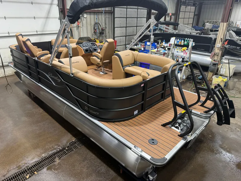 Slide: The Image of 2026 Bentley Pontoons Legacy 220 Navigator DL Quad Lounge indoors. - 44