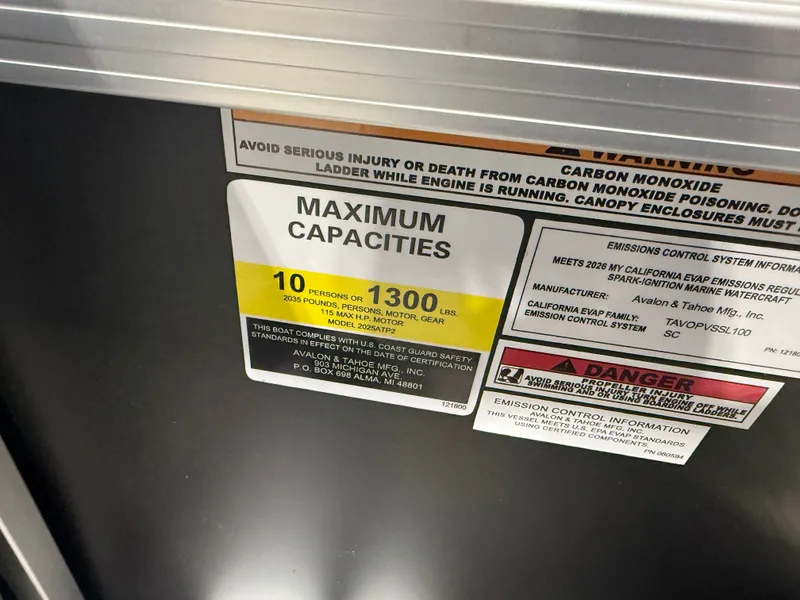 Slide: The Image of Warning label for Tahoe sport boat with capacity and safety information. - 16