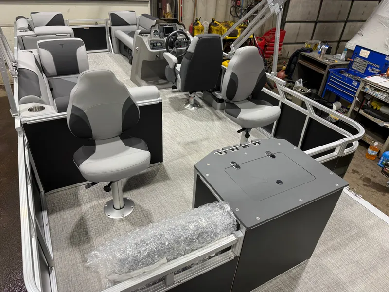 Slide: The Image of 2026 Tahoe Sport Rear Fish 2180 interior view, gray seats, control console. - 22