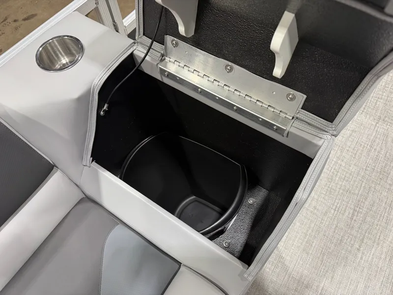 Slide: The Image of Interior of Tahoe Sport Rear Fish 2180, seat with storage compartment. - 25