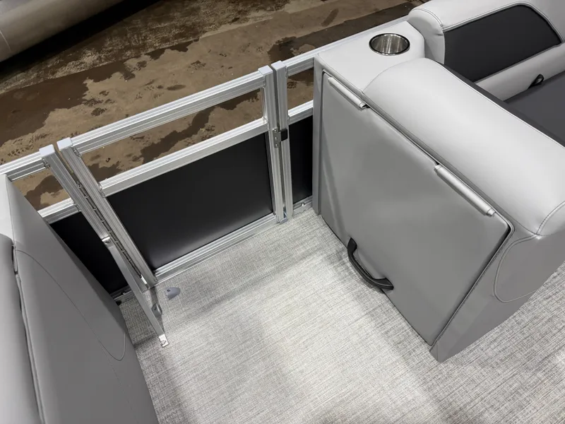 Slide: The Image of Interior of Tahoe Sport Rear Fish 2180, gray upholstery, cup holder, 2026 model. - 26