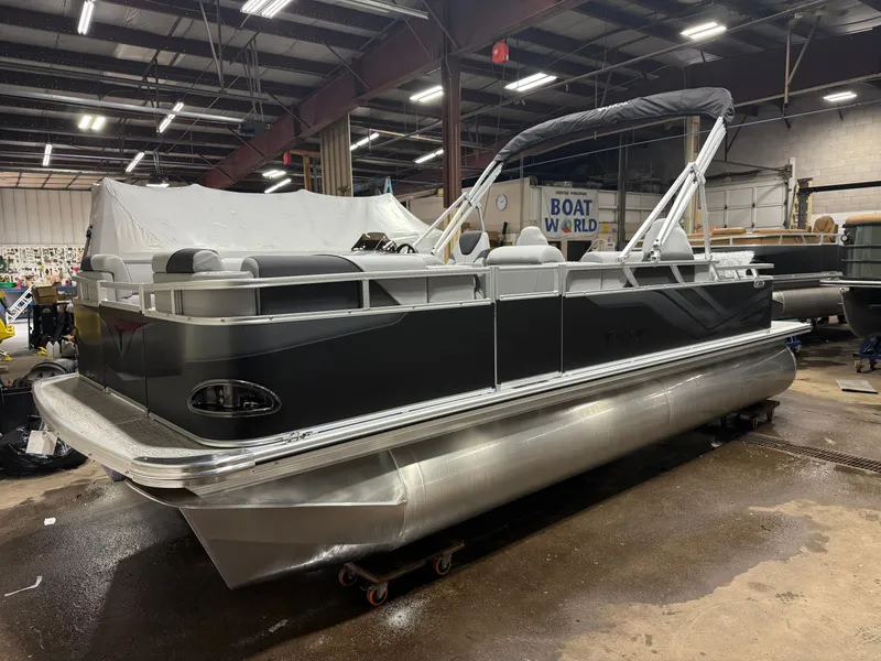 Slide: The Image of 2026 Tahoe Sport Rear Fish 2180 pontoon boat in warehouse. - 34
