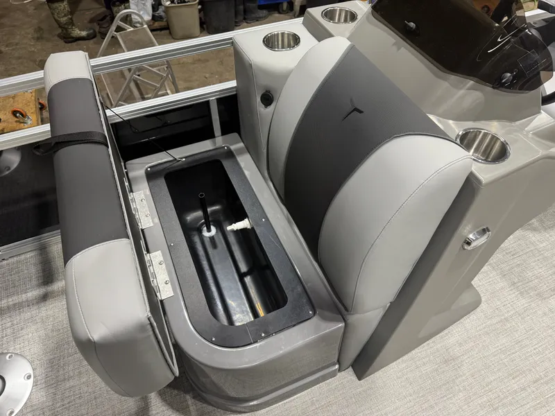 Slide: The Image of Interior of Tahoe Sport Quad Fish 1980 Pontoon 2026 with seating and storage. - 11