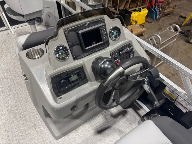 Slide: The Image of 2026 Tahoe Sport Quad Fish Pontoon steering console. - 14